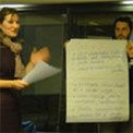 Speaker at the policy workshop with a flipchart