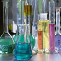 A series of flasks beakers containing coloured liquids